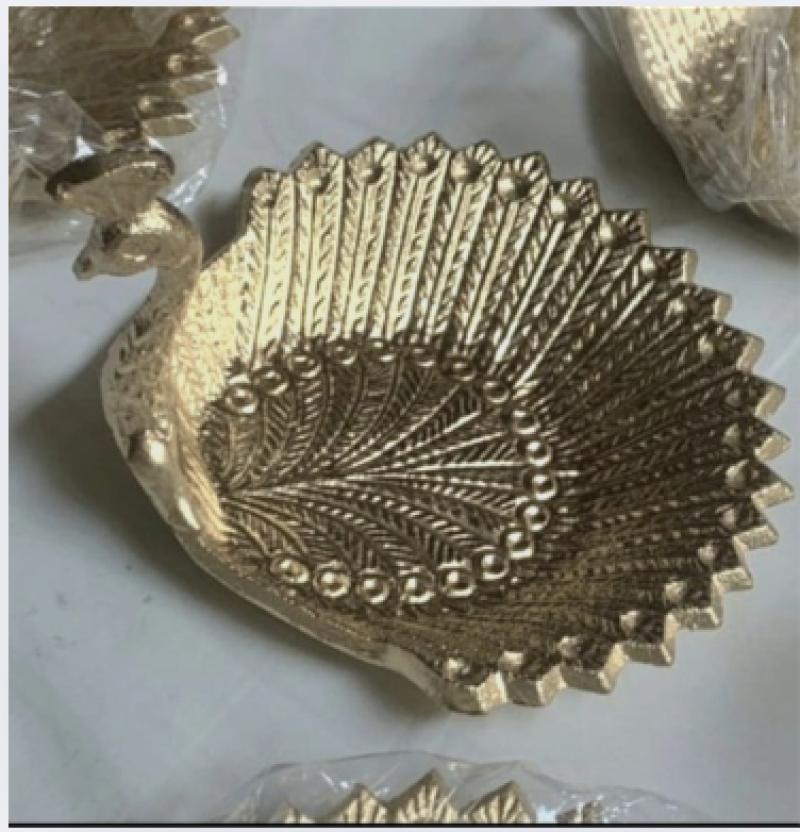 Golden Peacock Lamp Carved Metal Diya