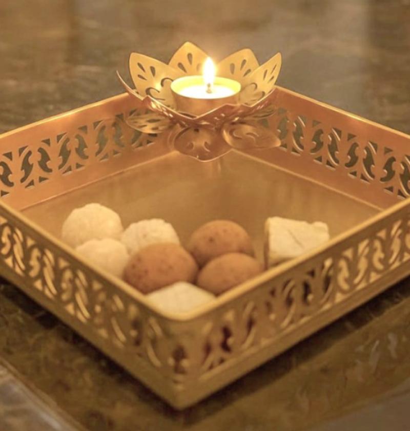 Metal Tray In Gold Finish With Attached Diya
