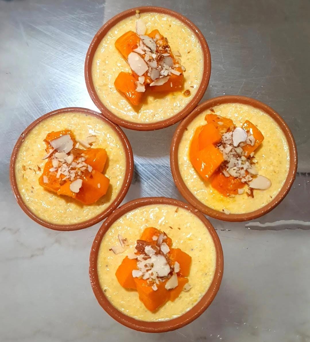 Mango Phirni With Delicious Mango Pieces With Nuts